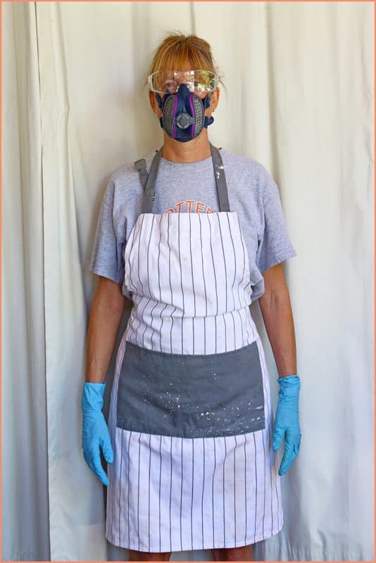 a picture of a potter wearing safety equipment