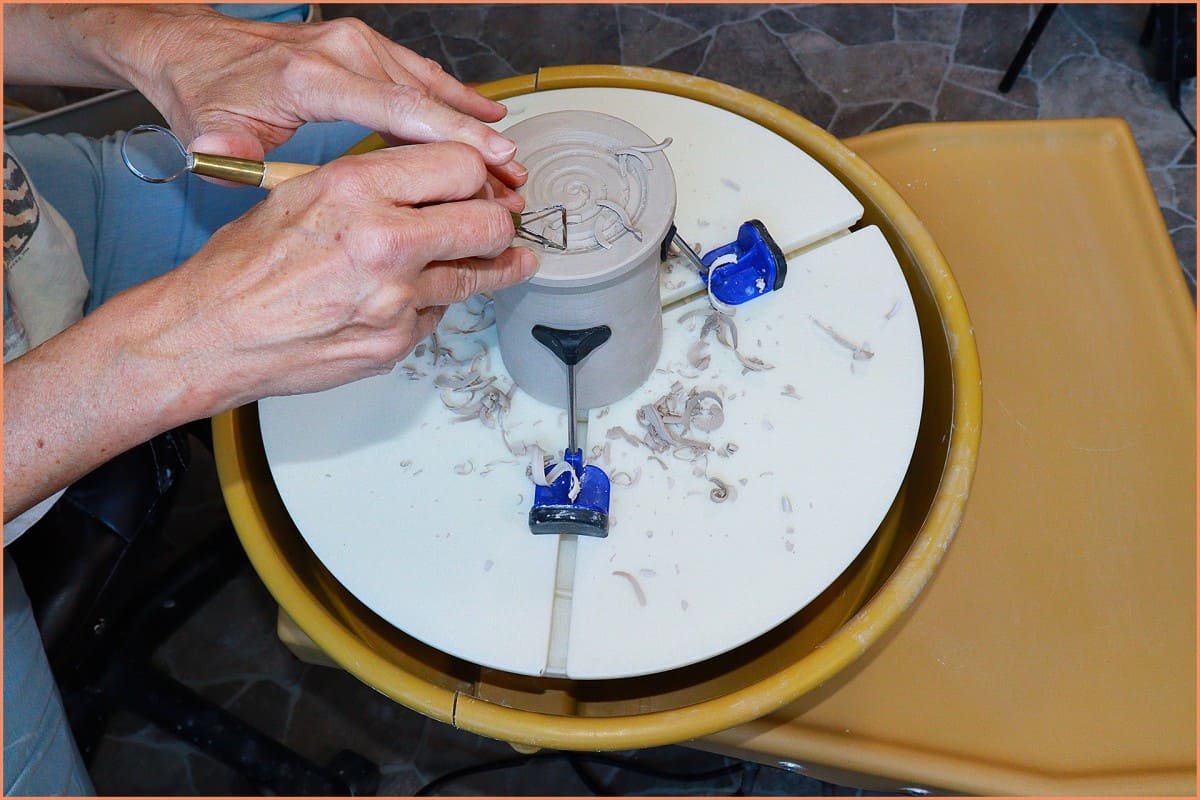 a picture of a potter Trimming