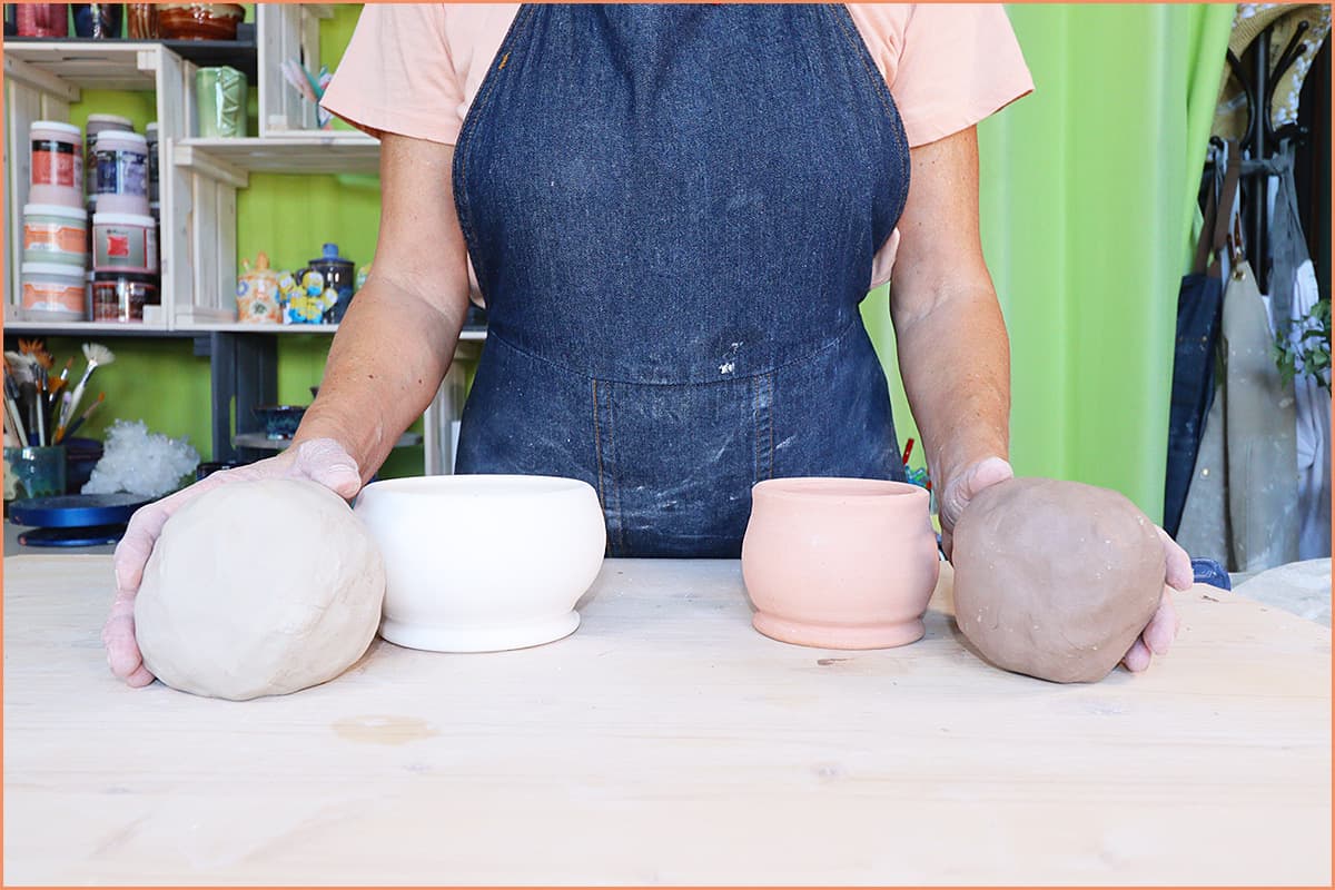a picture of Two pieces of clay with 2 pots