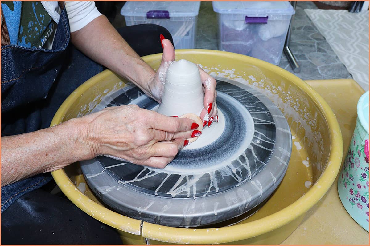 Coning up clay with long nails 1 1