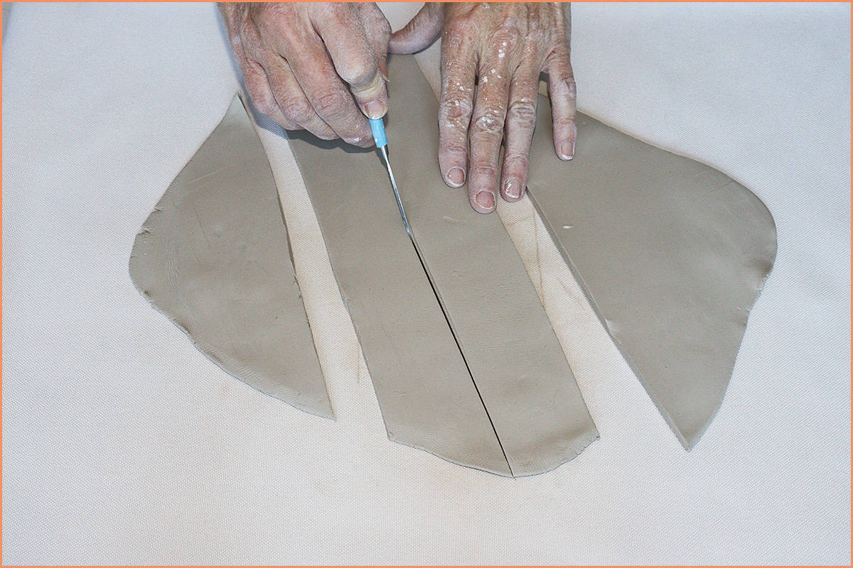 image of a potter hand building on canvas