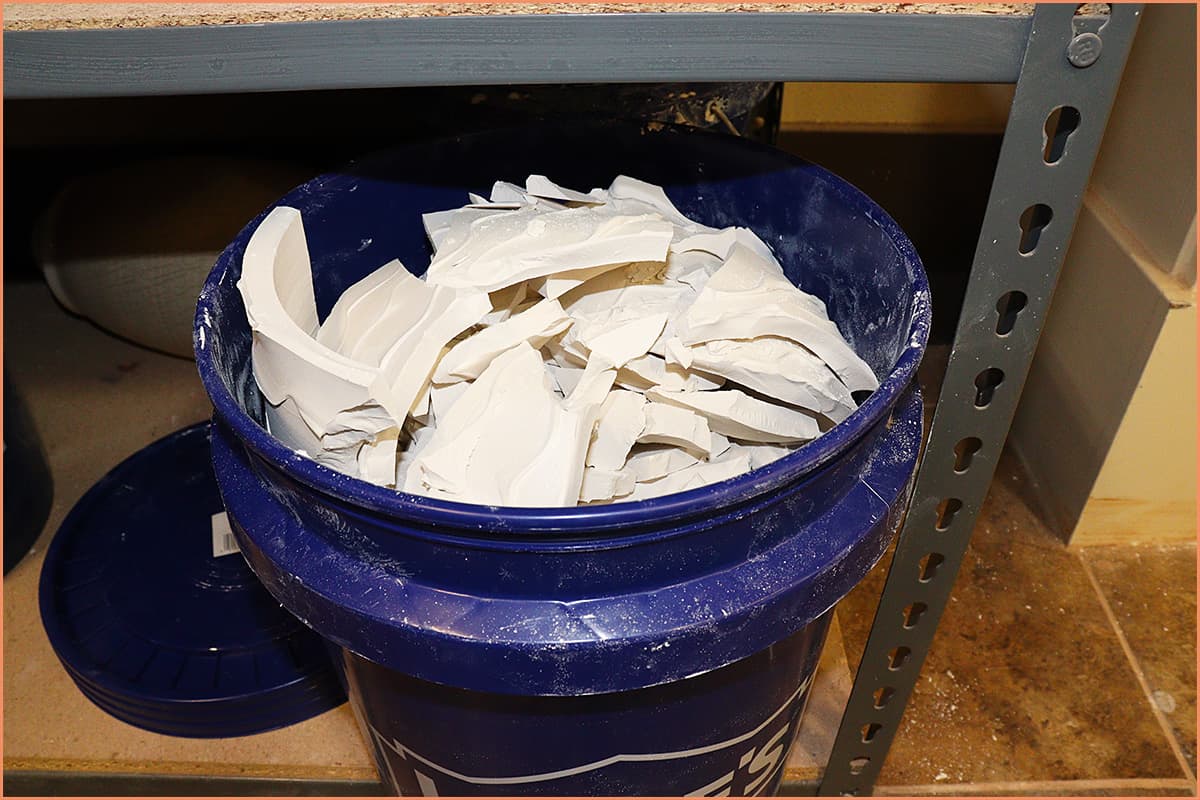 An Image of dry clay in a bucket