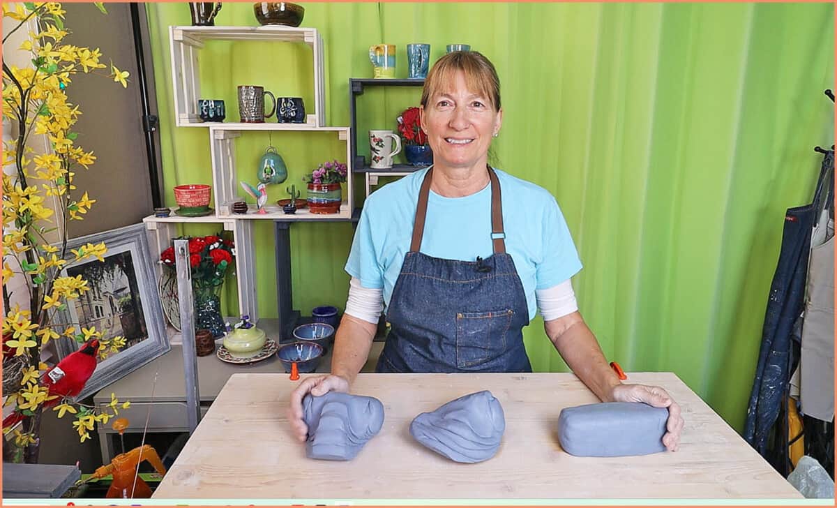 an image of of a potter with wedged clay