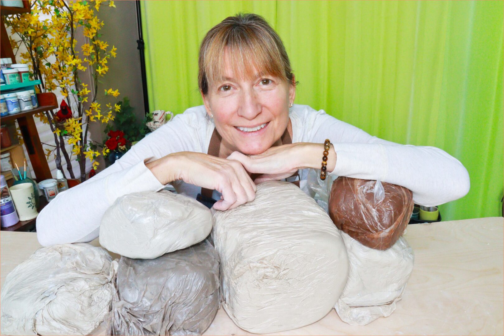 an image of a Potter resting on clay bodies